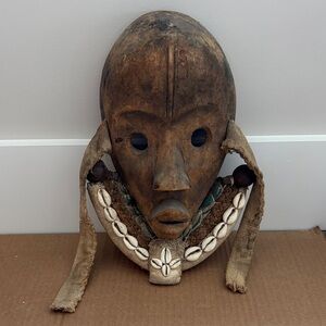 Handcrafted Tribal Mask with Shell Accents